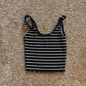 i small crop top w/ wavy ends and black and white stripes